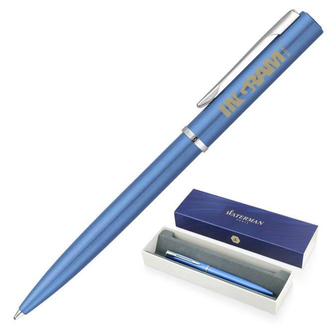 A blue ballpoint pen in a white box, featuring a sleek design and a silver clip, with a logo on the barrel.