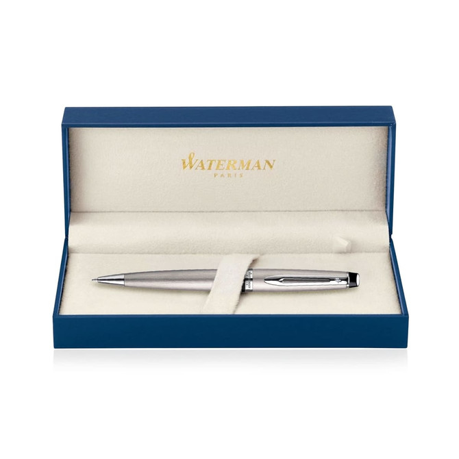 A metal ballpoint pen in brushed stainless steel, displayed in a blue box with a white interior and a logo.
