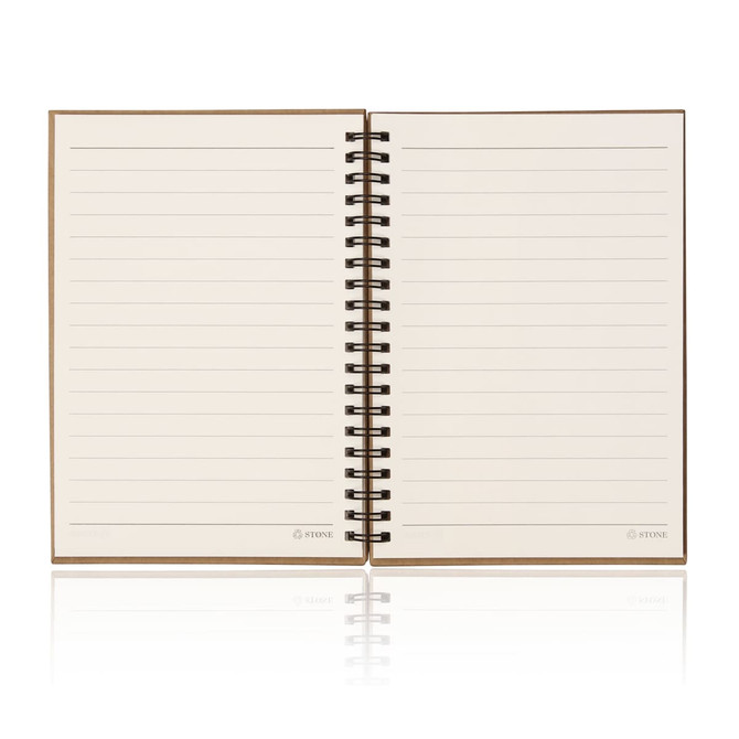 An A5 spiral-bound notebook featuring stone paper with lined pages, presented in a neutral colour. An A5 spiral-bound notebook featuring stone paper with lined pages, presented in a neutral colour.
