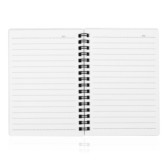 A spiral-bound A6 notebook with blank white lined pages and a black spiral binding.