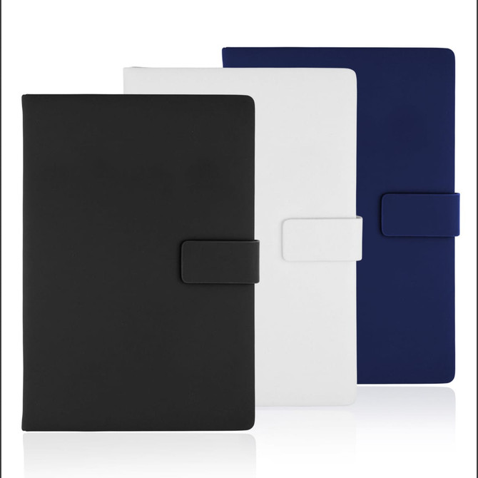 A set of three A5 notebooks with magnetic closures, featuring black, white, and navy blue covers.