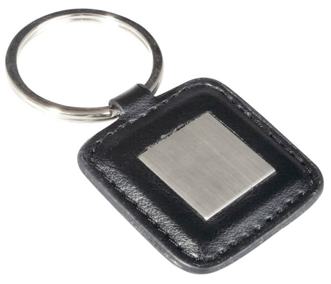 A square keyring with a metal centre and a black leather-look border, featuring a metal ring.