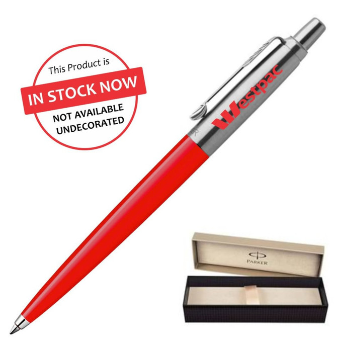 A red metal ballpoint pen with a silver clip and a branded logo, presented in a boxed packaging.