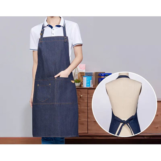 A denim bib apron with a neck strap, featuring a pocket and adjustable back, showcased in blue.