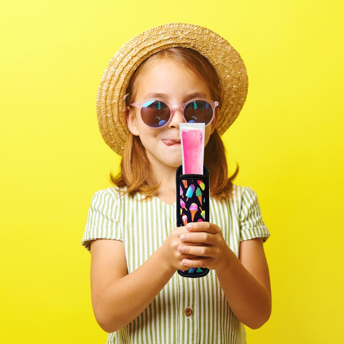 A child wearing sunglasses holds a colourful Icy Pole Holder with a pink icy pole against a bright yellow background.