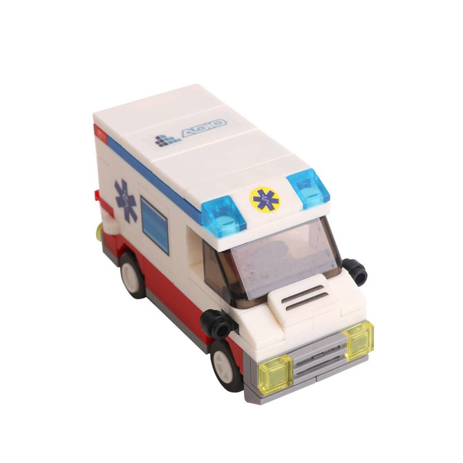 A toy ambulance building block set in white, red, and blue, featuring a detailed window and wheels.