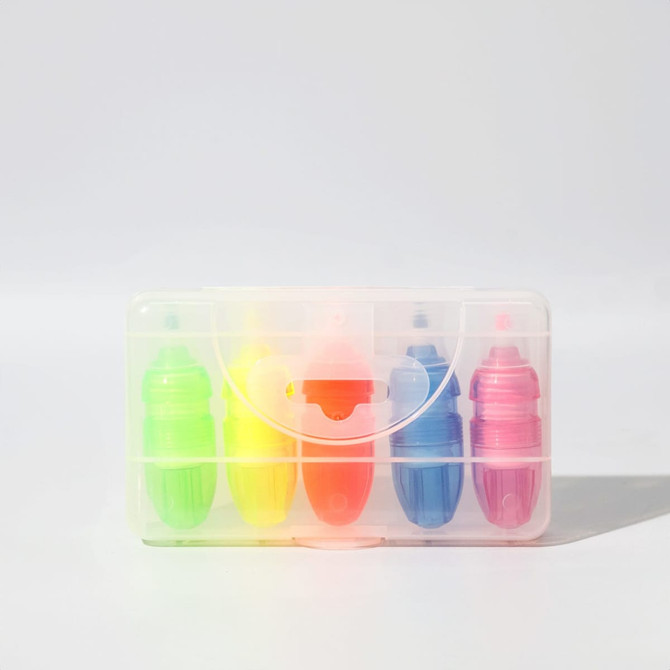 A set of highlighters in green, yellow, pink, and blue, contained in a clear plastic case with a handle. A set of highlighters in green, yellow, pink, and blue, contained in a clear plastic case with a handle.