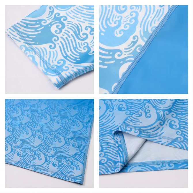 A blue sublimation short sleeves rashie featuring a wave pattern and a logo, highlighting its UPF 50+ protection.