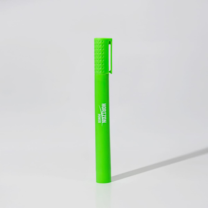 A green jumbo highlighter with a textured cap and a branding logo. A green jumbo highlighter with a textured cap and a branding logo.