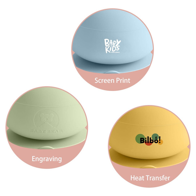 A silicone kids suction bowl in three colours: blue, green, and yellow, each featuring different branding styles.