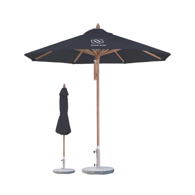 A black octagonal outdoor umbrella with a wooden pole, featuring a logo, alongside a folded umbrella.