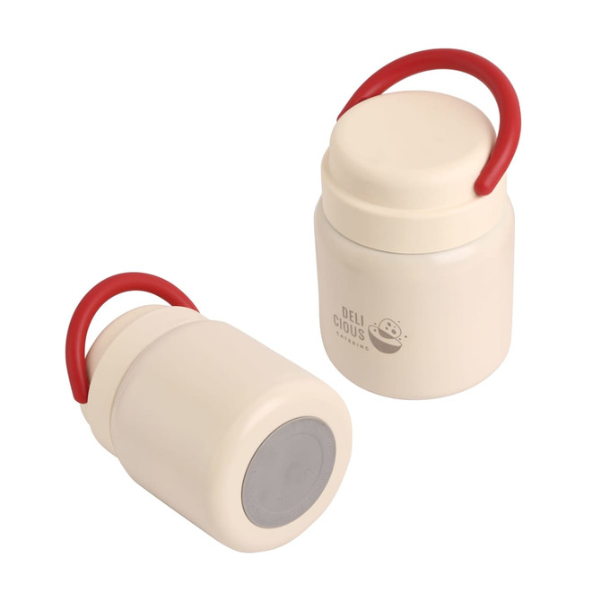 A stainless steel food jar in cream colour with a red handle and a logo on the side.