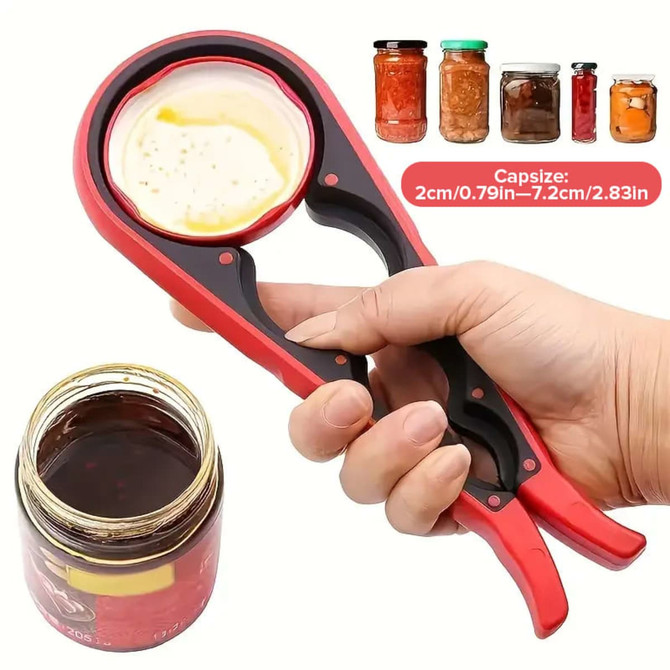 A red and black multi-purpose jar opener is held in a hand, with various jars of contents in the background.