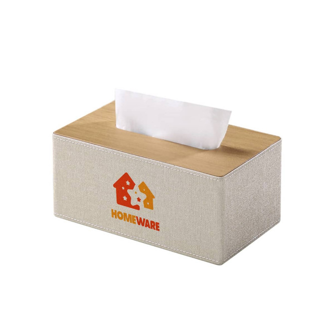 A large tissue box in beige fabric with a wooden lid and a logo on the front.