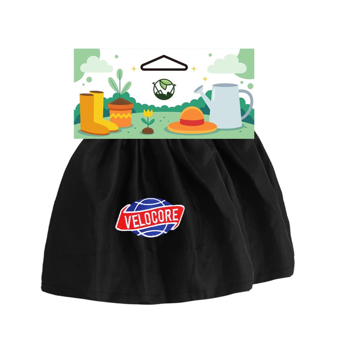 A pair of black waterproof boot covers with a logo, displayed with a gardening-themed card featuring boots and plants.