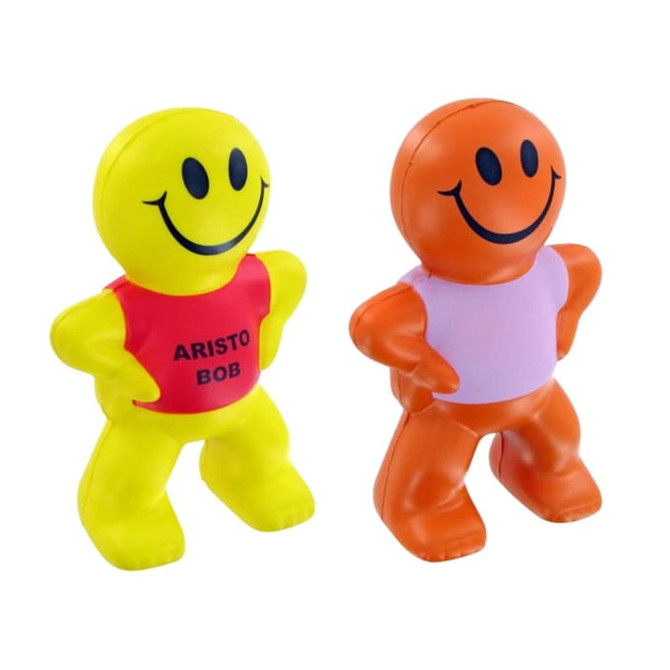 A yellow and orange stress reliever in the shape of smiling human figures, each with different colour outfits.