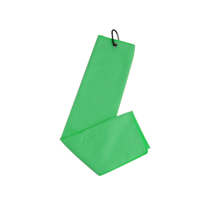 A green waffle golf towel with a hanging clip, featuring a textured design.