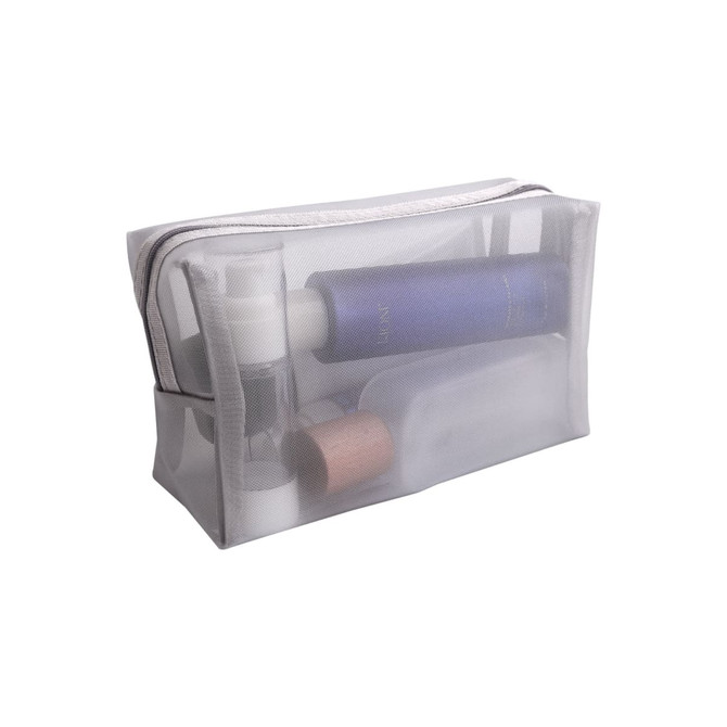 A transparent nylon mesh cosmetic bag containing various skincare and cosmetic products in multiple shades.