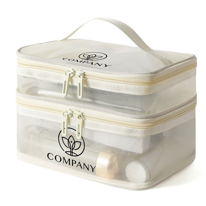 A double-layer cosmetic bag in cream nylon mesh with zippers and a handle, featuring a logo on the front.