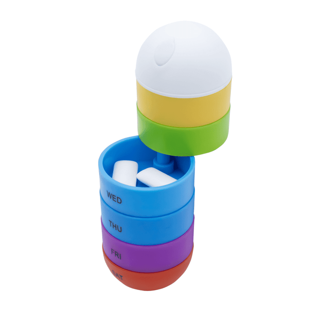 A multi-coloured pill tube featuring sections in green, yellow, blue, purple, and a white lid. It has a logo.
