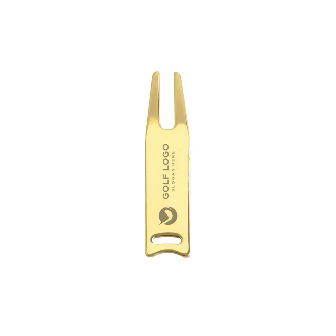 A gold golf divot tool with a logo and a two-pronged design for repairing golf greens.