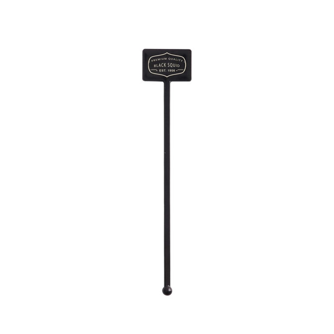 A black drink stirrer with a rectangular top featuring a logo. The stirrer has a rounded end for mixing.