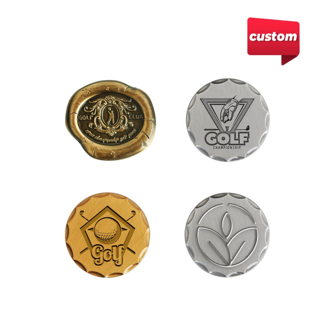 A collection of four 40mm custom antique golf ball markers in gold and silver finishes, featuring various designs and a logo.