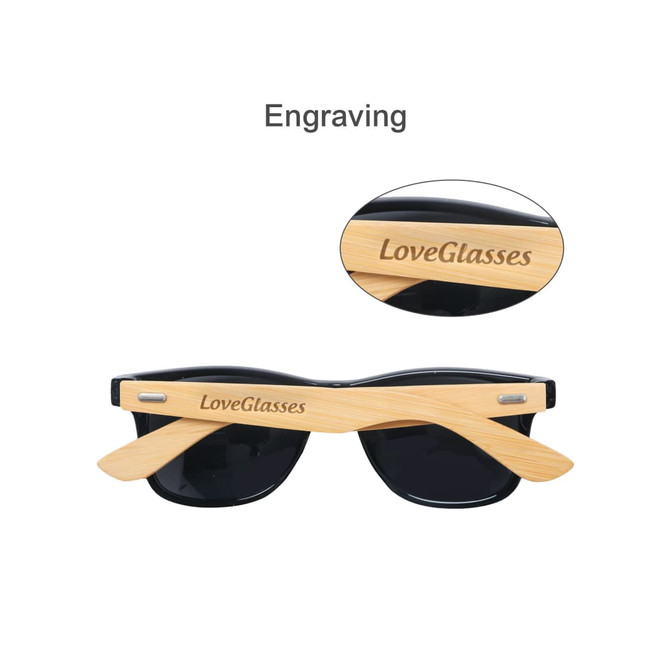 Bamboo sunglasses with black lenses and engraved wooden arms featuring a logo.