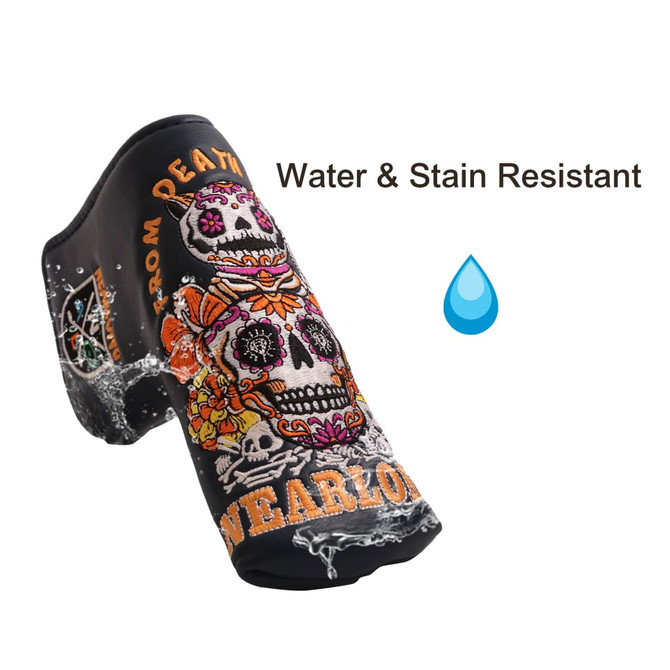 A custom blade putter cover in black with colourful skull designs, featuring water and stain resistant material.
