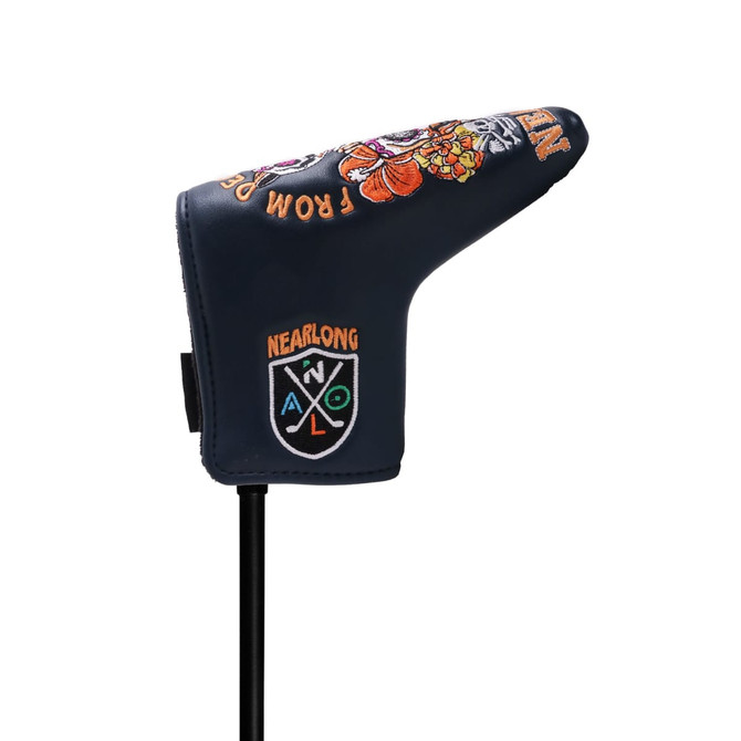 A navy custom blade putter cover with vibrant embroidered designs and a logo on the side.