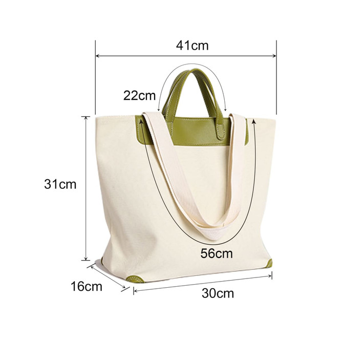 A canvas bag with a leather handle, featuring a cream colour and green accents, measured with dimensions visible.