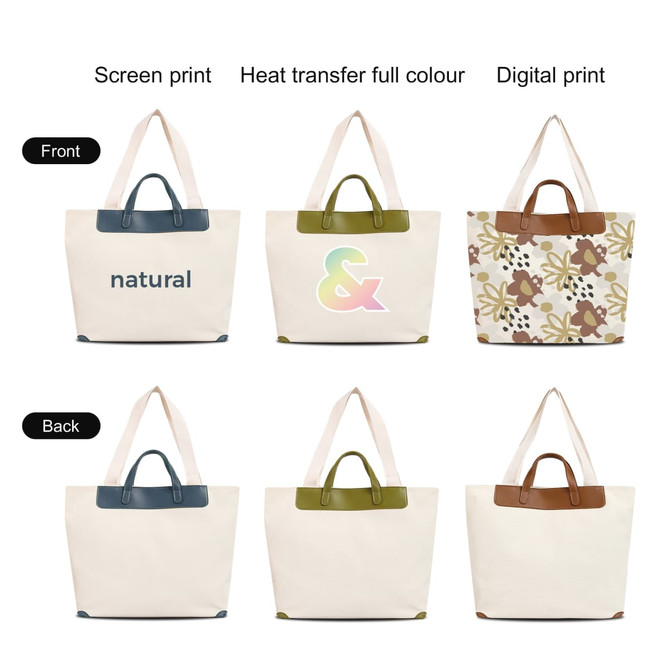 A canvas bag with leather handles in cream, featuring various designs on the front and back. Logo present.