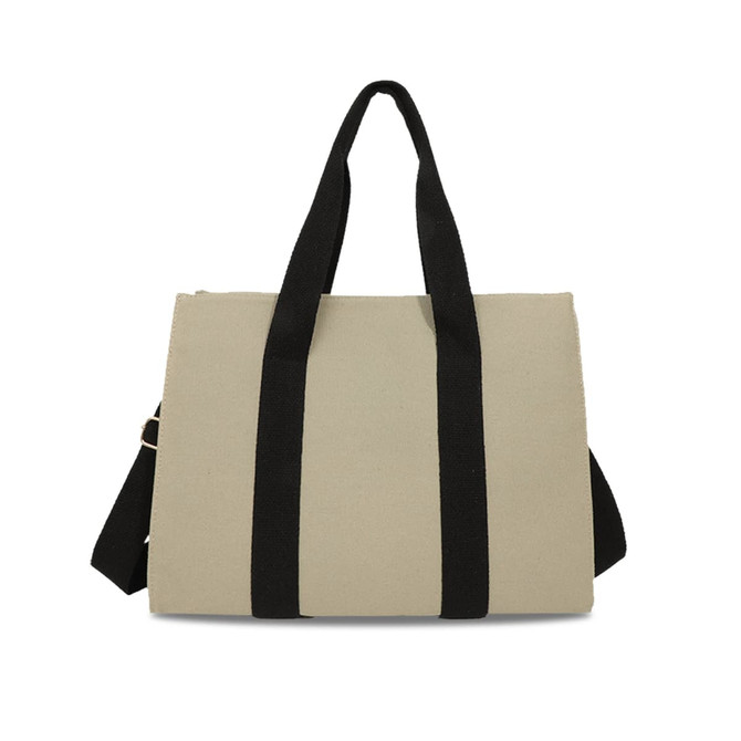 A beige canvas grocery shopping bag with black straps and a detachable shoulder strap. It features a logo.