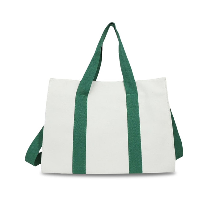A canvas grocery shopping bag in white with green straps, featuring a logo on one side.