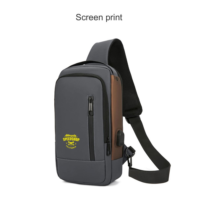 A grey and brown anti-theft sling bag with a single shoulder strap and a logo on the front.