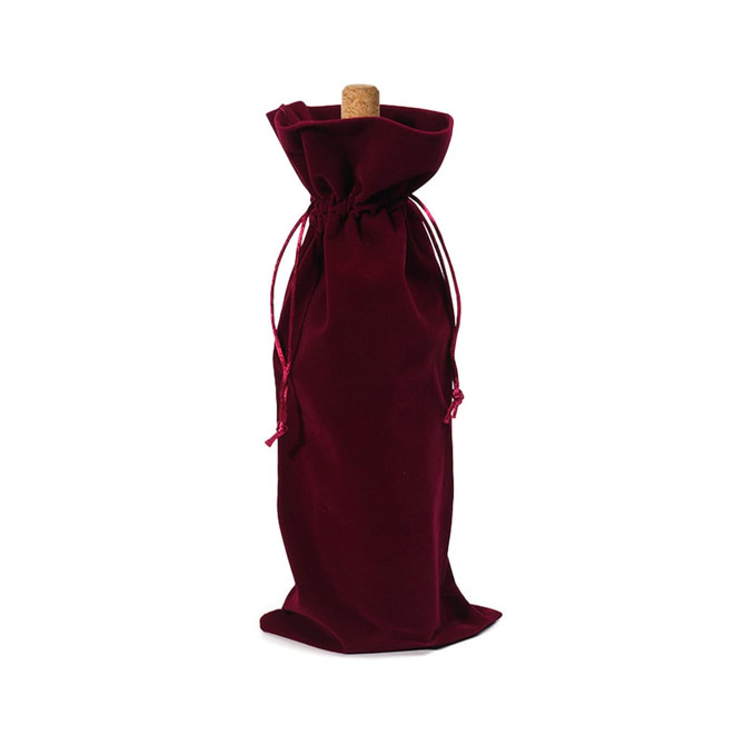 A drink bottle bag in rich burgundy flannel with a drawstring closure. Features a cork stopper and a logo. A drink bottle bag in rich burgundy flannel with a drawstring closure. Features a cork stopper and a logo.