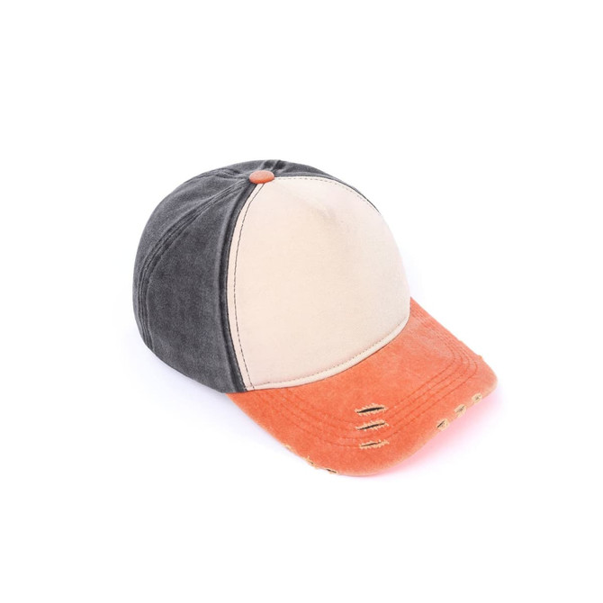 A distressed cotton baseball cap featuring a black and beige top with an orange brim and visible wear.
