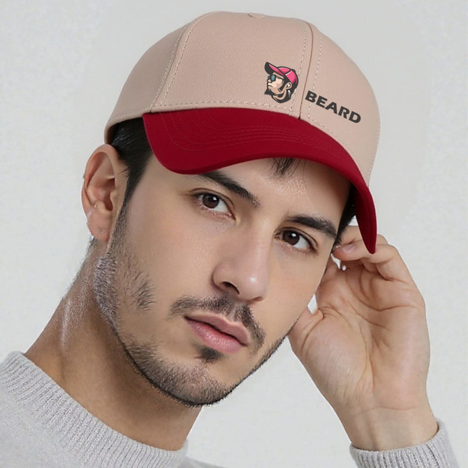 A beige and red 6 panel adjustable baseball cap with a logo. The cap features a curved brim and a snug fit.