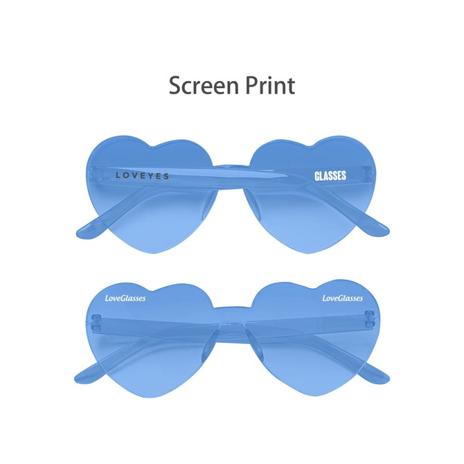 Heart-shaped sunglasses in a blue tint with a clear frame and branding on the arms.