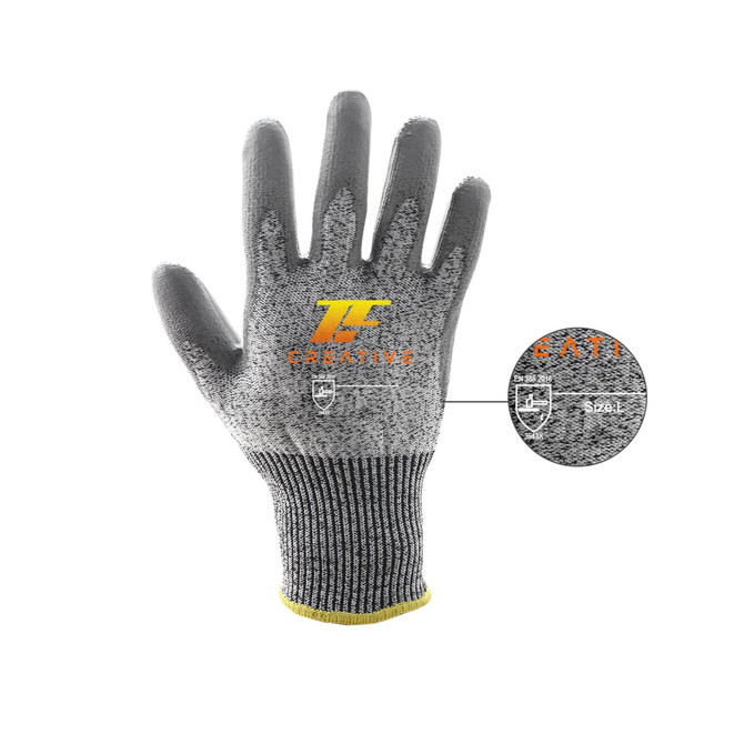 Cut resistant PU gloves in grey with a yellow wrist cuff, featuring a logo on the back of the hand.