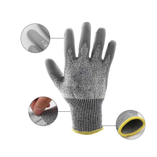 A pair of cut-resistant gloves in grey with a yellow cuff, showcasing textured fingertips and a snug fit.