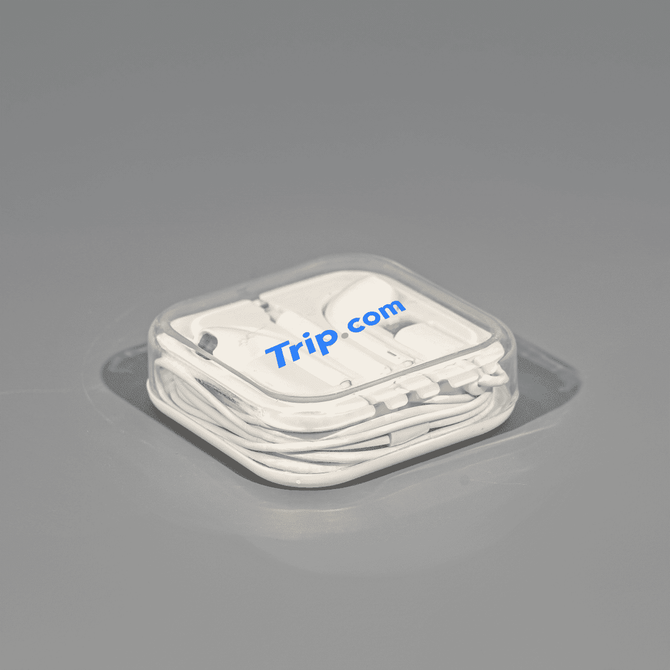 A pair of white USB Type C earphones in a transparent square case, featuring a logo. A pair of white USB Type C earphones in a transparent square case, featuring a logo.