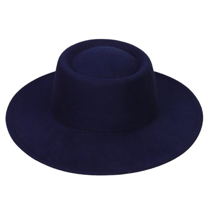 A flat-top felt fedora hat in a dark navy colour, featuring a minimalist design and a round crown.