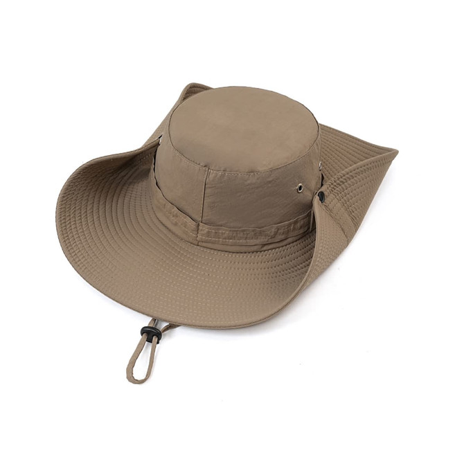 A wide brim sun hat in beige with a round crown and adjustable chin strap. Features ventilation holes on the sides.