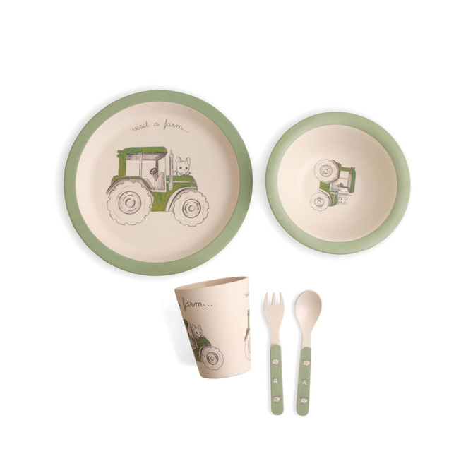 Bamboo fibre tableware set in cream with green trim, featuring a tractor design. Includes a bowl, plate, cup, and utensils.