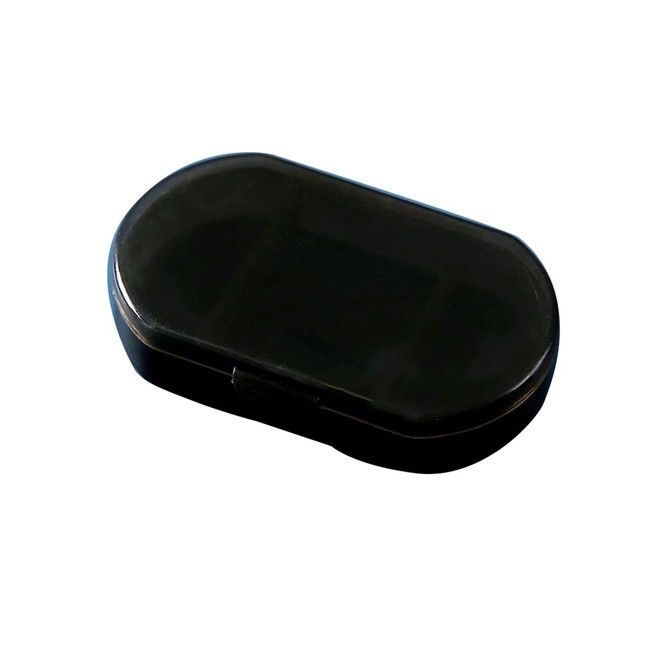 A black, oval pill box featuring three compartments and a secure closure, with a smooth surface.