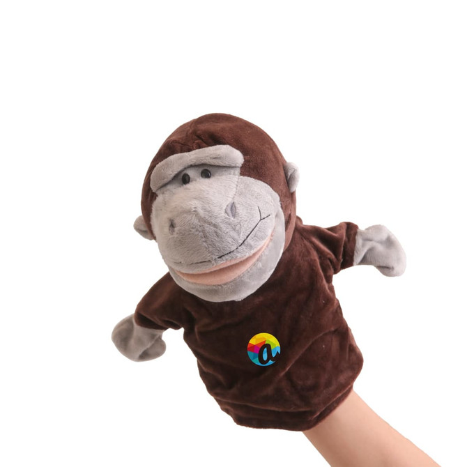 A brown plush monkey hand puppet with grey accents and a logo on its chest.