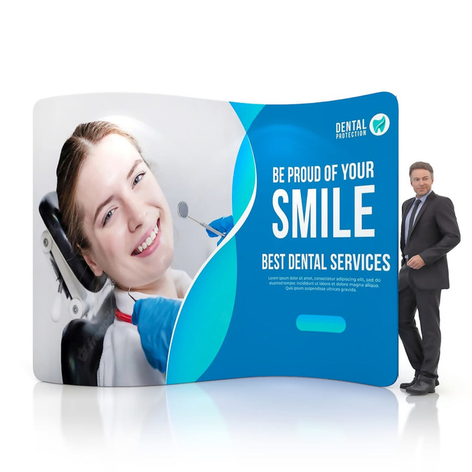 An S-shaped tension fabric display wall featuring a smiling woman in a dental chair and a man in a suit. An S-shaped tension fabric display wall featuring a smiling woman in a dental chair and a man in a suit.