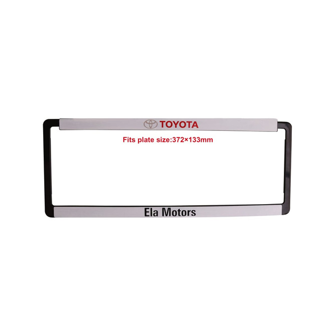 A plastic licence plate frame in black and silver, featuring a logo and space for plate size.
