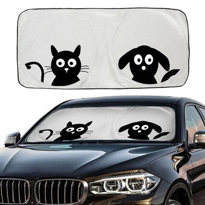 A foldable car shade featuring black silhouettes of a cat and dog on a light background, fitting over a vehicle's windshield.